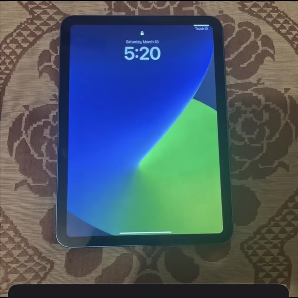 Apple Tablet with Black Frame and Vibrant Display